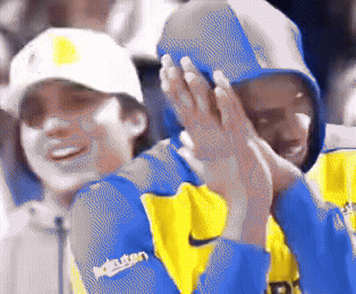 Man In Blue And Yellow Jacket With Rakuten GIF
