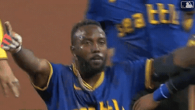 Man In Blue And Yellow Jersey On Baseball Field GIF