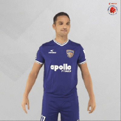 Man In Blue Apollo Tires Jersey Holding Soccer Ball GIF
