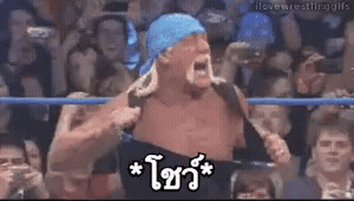 Man In Blue Bandana Holding Sword In Front Of Crowd GIF