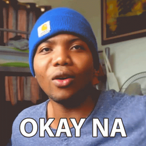 Man In Blue Beanie Saying Okay Na GIF