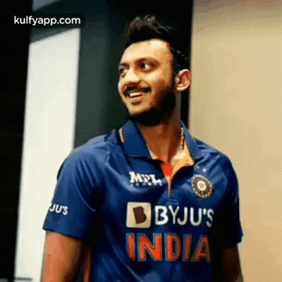 Man In Blue Byju's India Cricket Jersey Smiling GIF