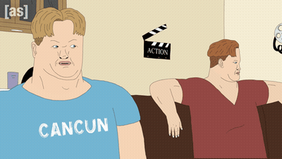 Man In Blue Cancun Shirt Sitting GIF