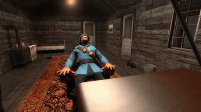 Man In Blue Coat Sitting In Chair GIF