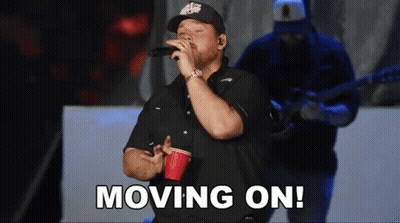 Man In Blue Columbia Shirt On Boat GIF