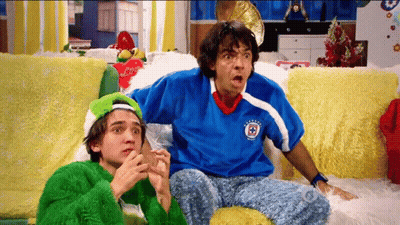 Man In Blue Cruz Shirt Sitting GIF