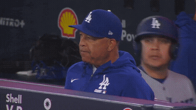 Man In Blue Dodgers Hat In Dugout GIF