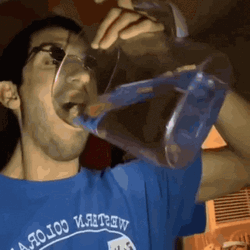 Man In Blue Drinking Water GIF
