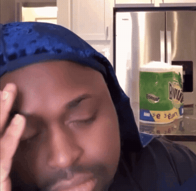 Man In Blue Du Rag Holding Head Before Bounty Toilet Paper GIF