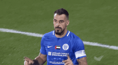Man In Blue Emirates Islamic Jersey GIF