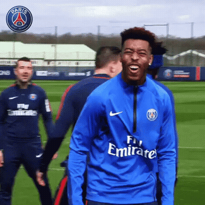 Man In Blue Fly Emirates Shirt Laughing GIF