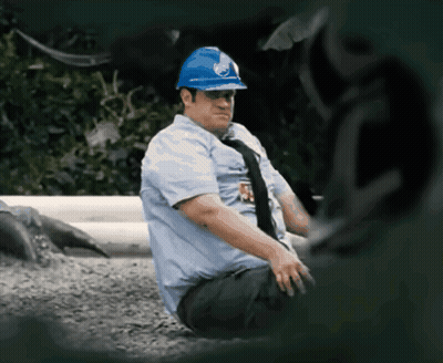 Man In Blue Hard Hat With R Badge GIF
