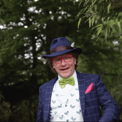 Man In Blue Hat And Glasses Smiling GIF