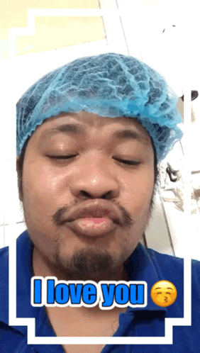 Man In Blue Hat And Shirt Saying I Love You GIF