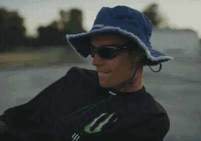 Man In Blue Hat And Sunglasses With Monster Logo GIF
