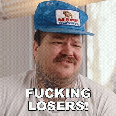 Man In Blue Hat And White Shirt Saying Fucking Losers GIF