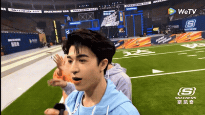 Man In Blue Hat Saying Guns GIF