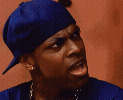 Man In Blue Hat Sticking Tongue Out GIF