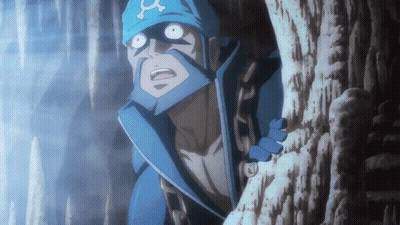 Man in Blue Hat With Letter A Standing in Cave