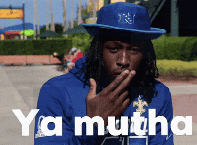 Man In Blue Hat With Letter N Covering Mouth GIF