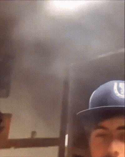 Man In Blue Hat With Letter U GIF