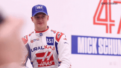 Man In Blue Hat With Number 1 & 1 GIF