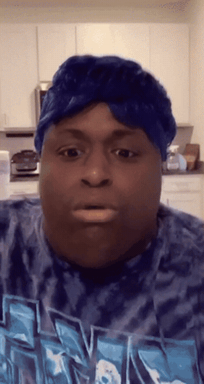 Man In Blue Headband And Tie Dye Shirt GIF