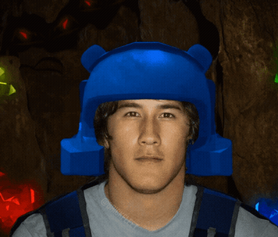 Man In Blue Helmet In Front Of Glowing Gems GIF
