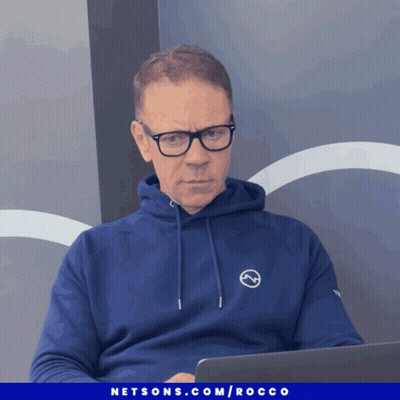 Man In Blue Hoodie And Glasses At Laptop GIF
