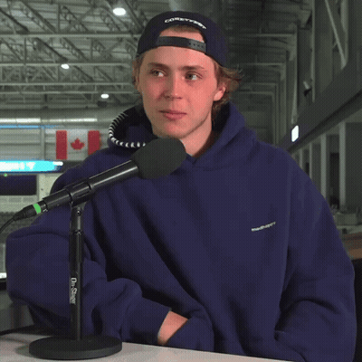 Man In Blue Hoodie At Dr. Singer Microphone GIF