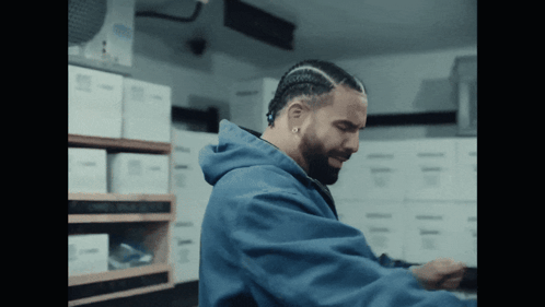 Man In Blue Hoodie In Room GIF