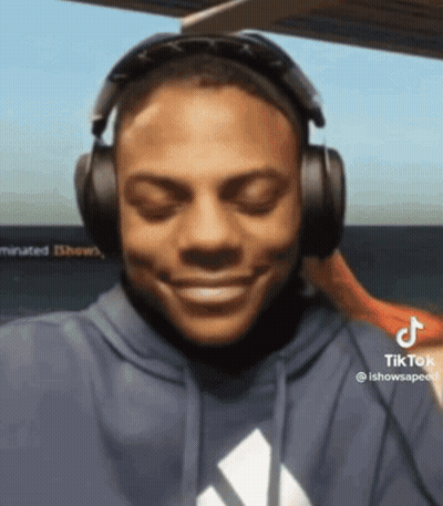 Man In Blue Hoodie Listening To TikTok GIF
