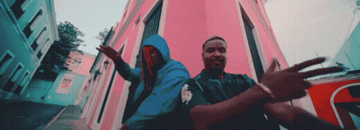 Man In Blue Hoodie Next To Man GIF