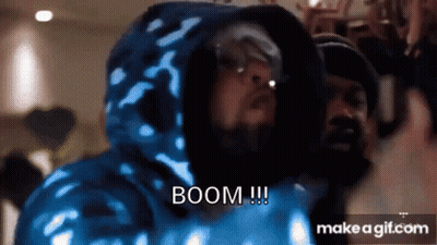Man in Blue Hoodie Saying Boom