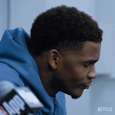 Man In Blue Hoodie Talking Into Microphone GIF
