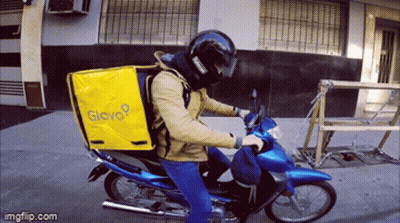 Man In Blue Hoodie With Adidas Logo And Headphones GIF