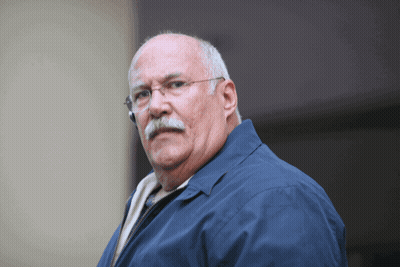 Man In Blue Jacket And Glasses GIF