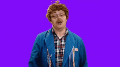 Man In Blue Jacket And Plaid Making Face GIF