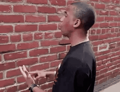 Man In Blue Jacket And Red Shirt Number 10 GIF