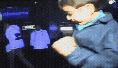 Man In Blue Jacket By Smithmans Sign GIF