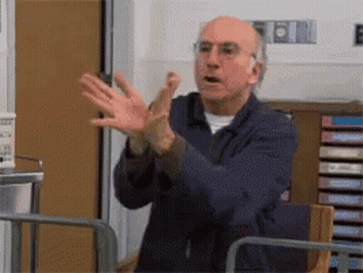 Man In Blue Jacket Clapping In Hospital Room GIF