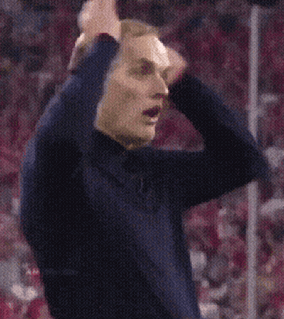 Man In Blue Jacket Covering Ears GIF