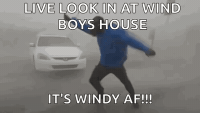 Man In Blue Jacket Dancing By White Car GIF