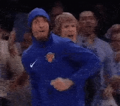 Man In Blue Jacket Dancing In Crowd GIF