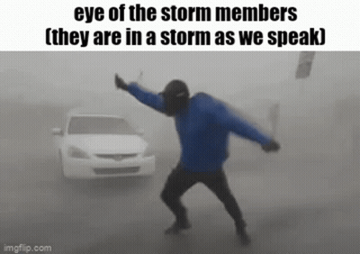 Man In Blue Jacket Dancing In Storm GIF