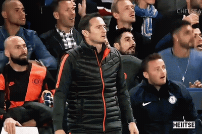 Man In Blue Jacket Dancing In Yellow Vest Saying Heitse GIF