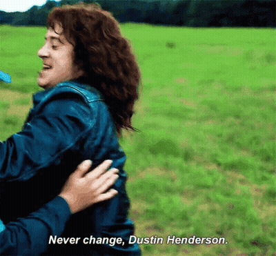Man In Blue Jacket Hugging Another Man Saying Never Change Dustin Henderson GIF