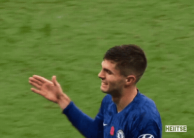 Man In Blue Jacket Hugging Man In Blue Shirt Number 10 GIF