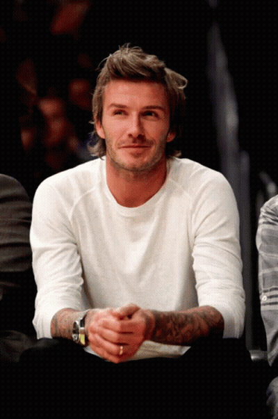 Man In Blue Jacket Kicks Soccer Ball GIF