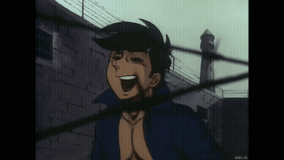 Man In Blue Jacket Laughing In Front Of Building GIF